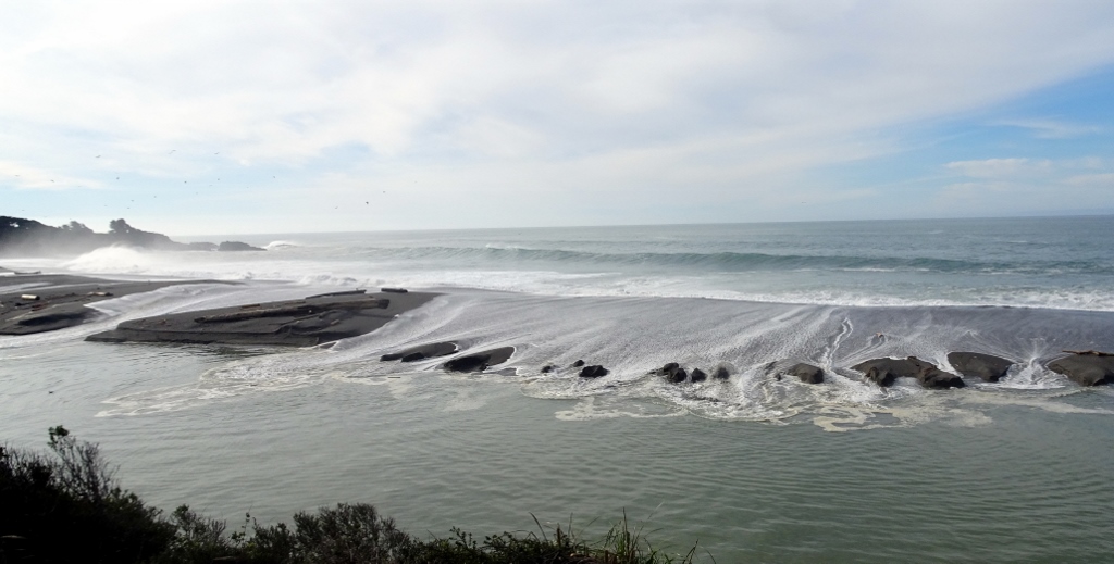 King Tides brought waves over the sandbar of the Gualala River, as